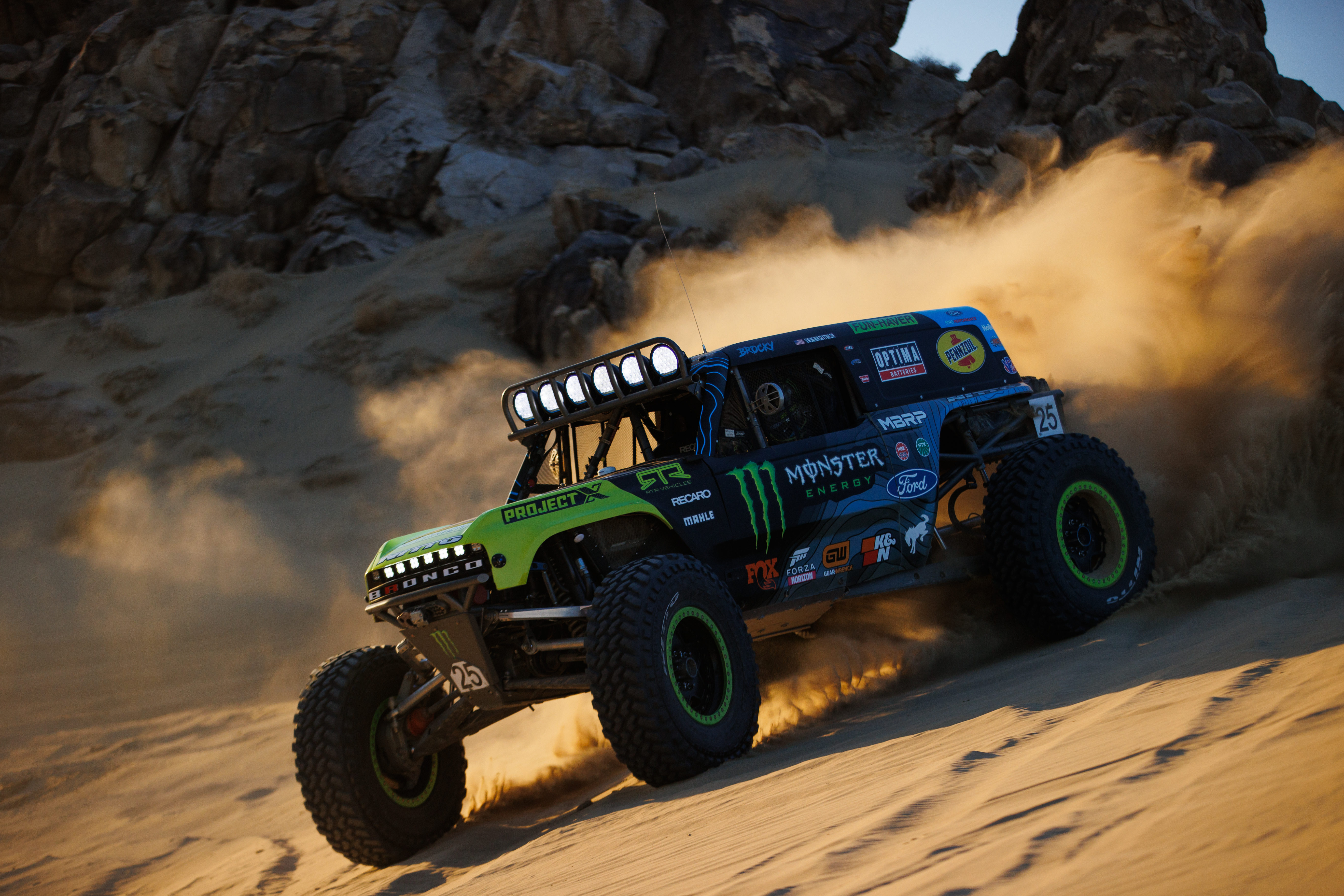 vehicle racing in the desert with an mbrp exhaust