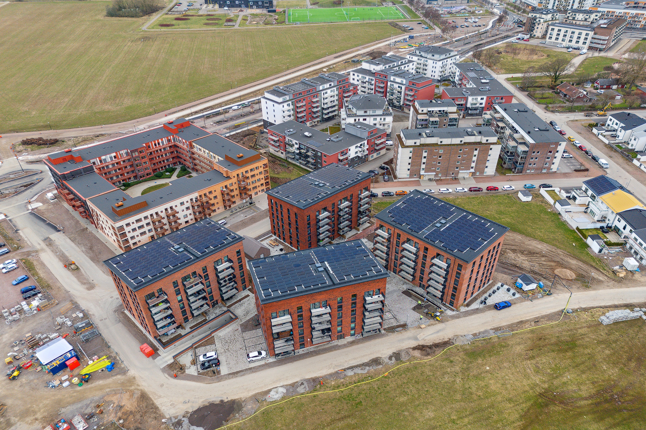 Bild av VéloCity med moderna lägenheter och omgivande natur