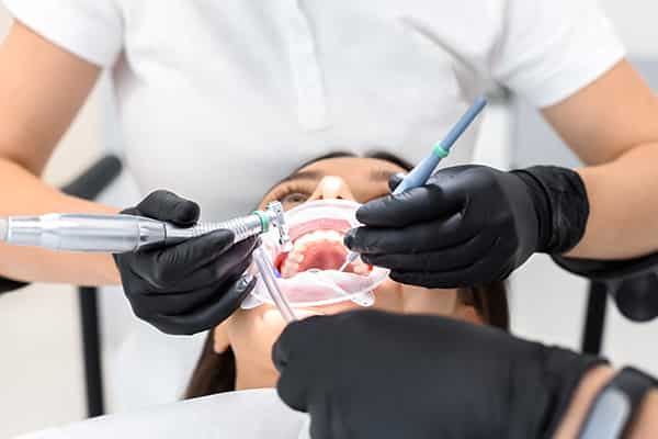 Dental procedure in progress on patient
